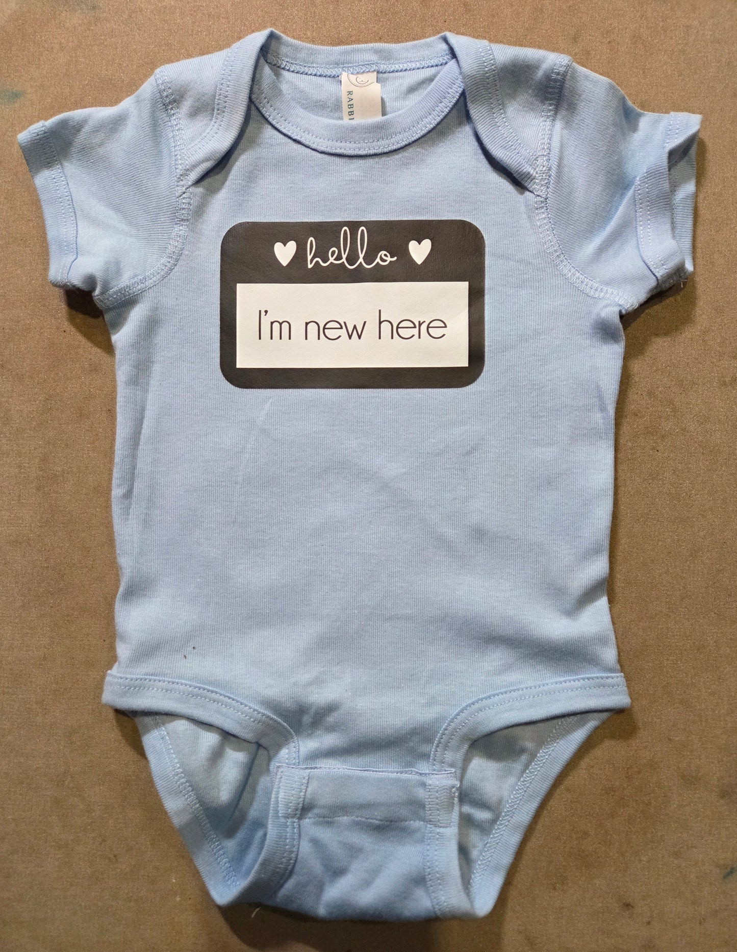 Hello, I'm New Here Onesie