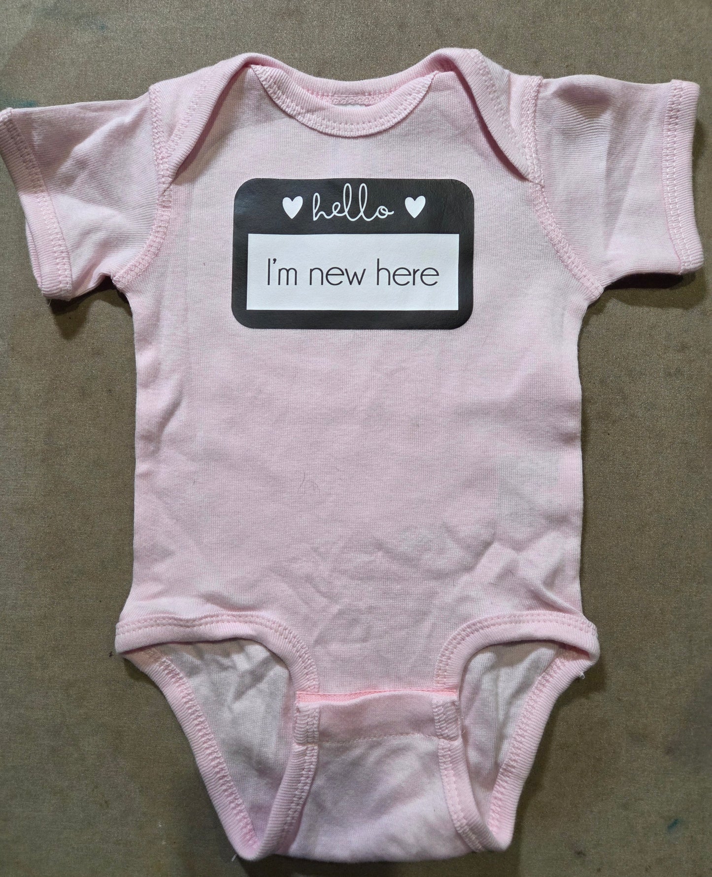 Hello, I'm New Here Onesie