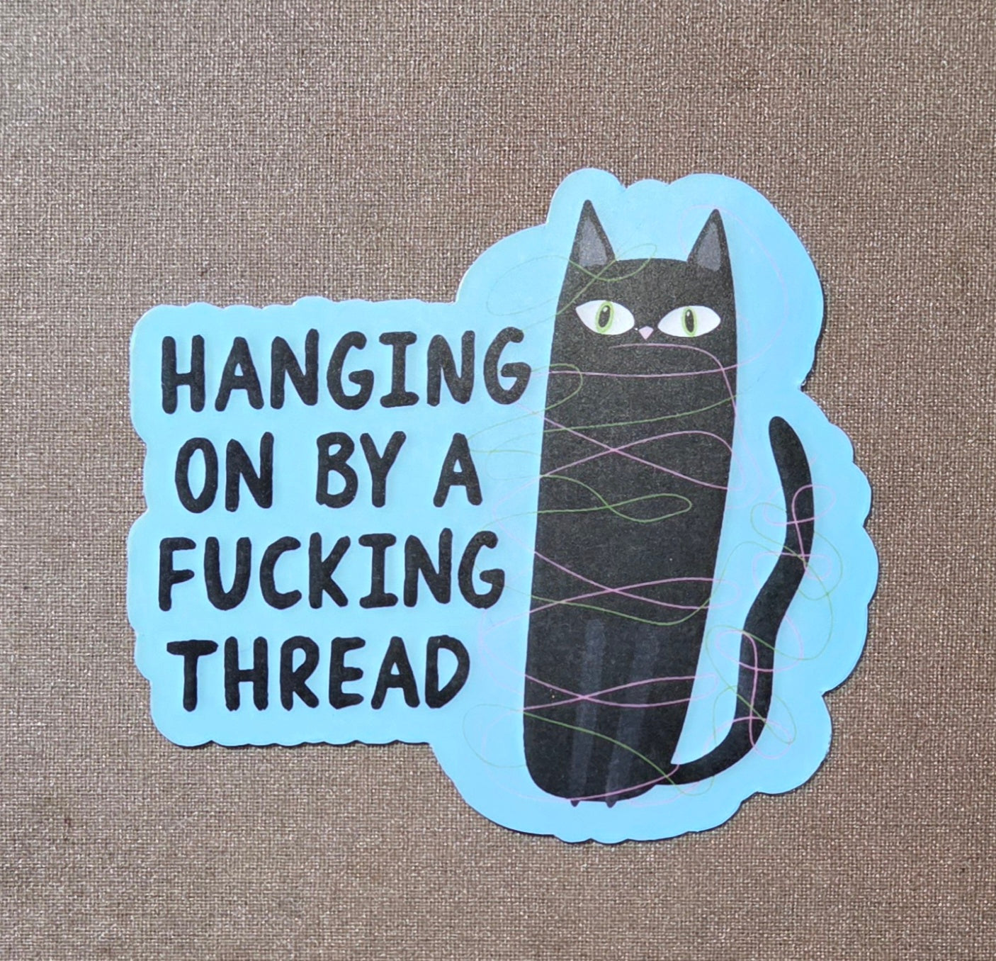 Hanging on by a Fucking Thread Sticker