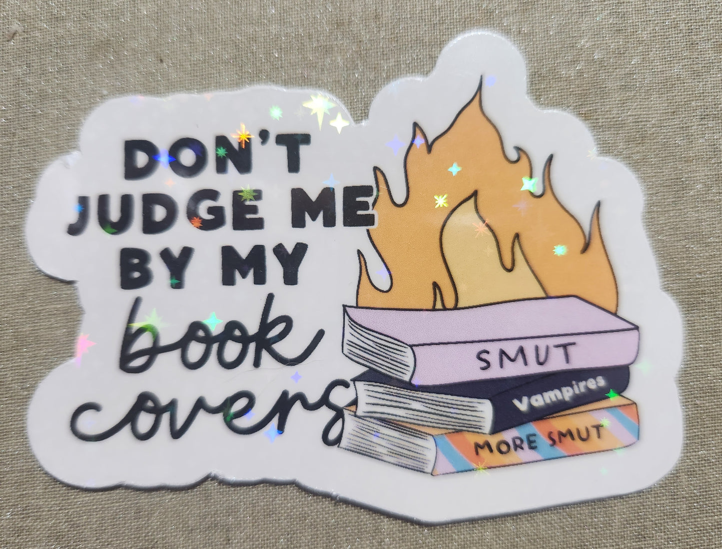 Don't Judge Me By My Book Covers Sticker