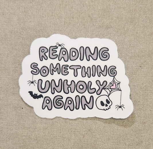 Reading Something Unholy Again Sticker